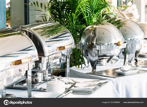 Breakfast with Catering buffet in restaurant Stock Photo by ©mrsiraphol ...