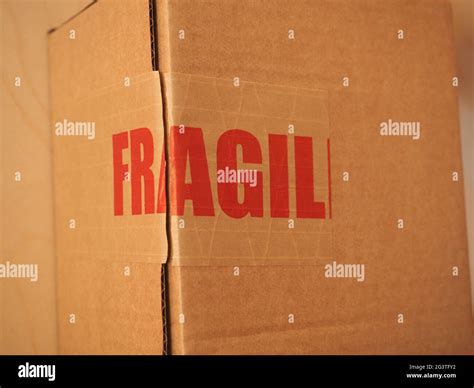 Fragile cardboard box Stock Photo - Alamy