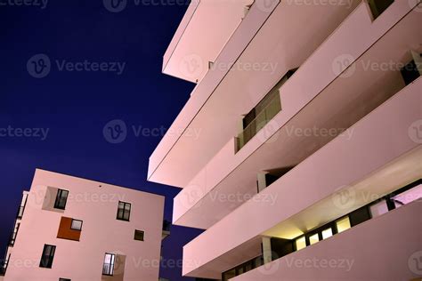 Exterior of apartment building at night 27852657 Stock Photo at Vecteezy