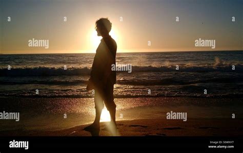 Sunset Beach Silhouette Stock Photo - Alamy