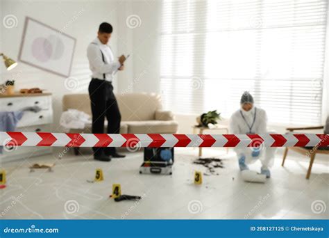 Investigators Working at Crime Scene in Living Room Stock Image - Image ...