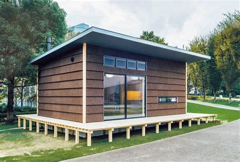 jasper morrison's muji hut in tokyo features cork façades