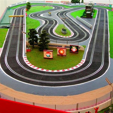 Scalextric. Had the biggest layout in the neighborhood. Dad clad the ...