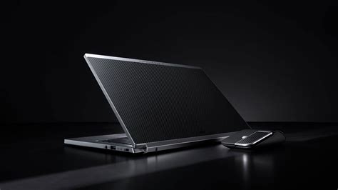 Acer just announced a metal & carbon fiber laptop designed by Porsche