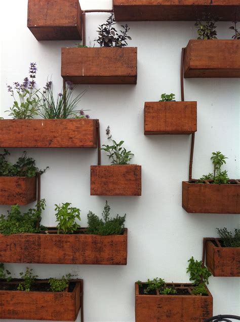 Vertical herb garden | Garden wall planter boxes, Vertical garden wall ...