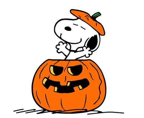 a cartoon character sitting on top of a pumpkin