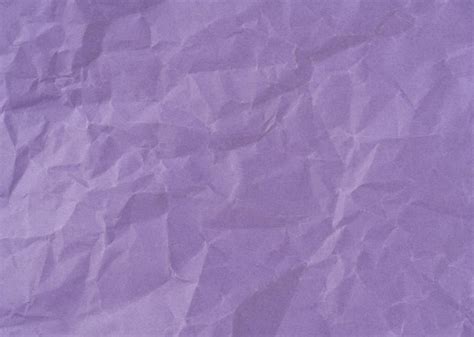 Premium Photo | Wrinkled sheet of purple paper textured backdrop