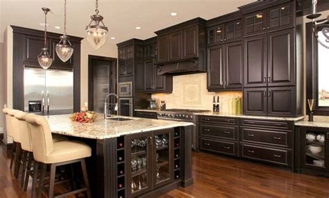 Espresso kitchen cabinets are often seen in kitchen design as this ...