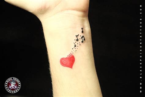 Stunning Musical Notes Tattoo - Black Poison Tattoos