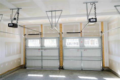 Garage Door Spring Repair: Should I Replace On My Own Or Not ...