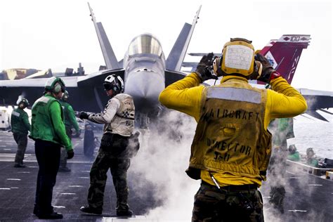 Flight Deck Crew. | Aircraft carrier, Us navy aircraft, Flight deck