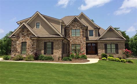 Two Story Home with Brick and Stone Exterior | Ranch style house plans ...