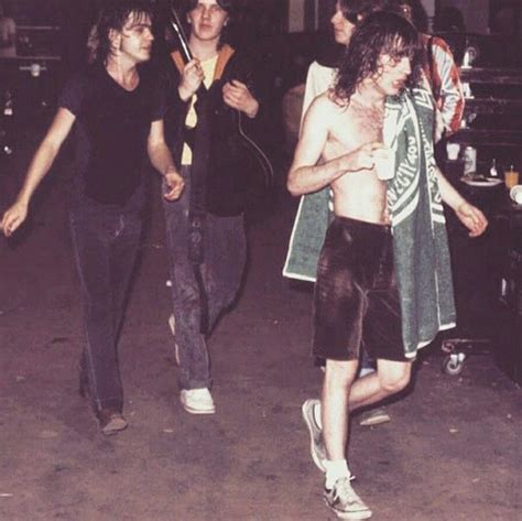 Malcolm and Angus Young - after finishing a show | Angus young, Acdc ...