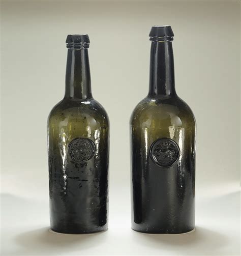 TWO DARK GREEN GLASS SEALED CYLINDER WINE BOTTLES , England, c1800 ...