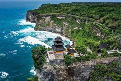 Uluwatu Temple In Bali: Famous Cliff Sunset At Uluwatu Bali