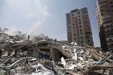 Netanyahu warns Gaza civilians after Israel destroys 13-storey building ...