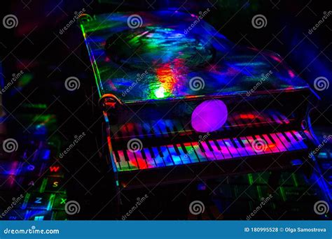 Piano on a Dark Background in the Light of Lamps. Close-up. Background ...