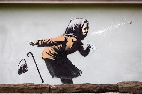 Street art depicting sneezing woman by Banksy appears on home