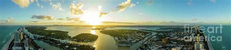 Aerial panorama beautiful Miami Beach sunset. View of islands wa ...