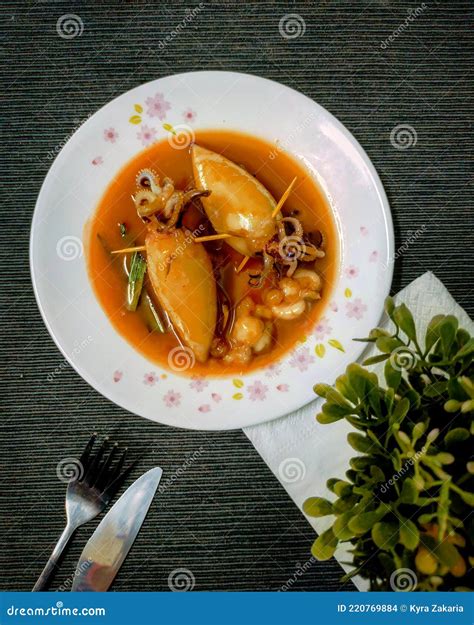 07 June 2021 Ketupat Sotong is Squid Stuffed with Glutinous Rice Cooked ...