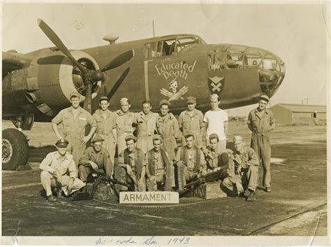 Armament crew posing in front of B-25 Mitchell bomber at Chatham Field ...