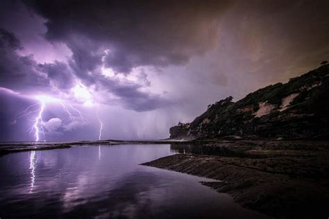 Purple lightning streaks at sea | Free Photo - rawpixel