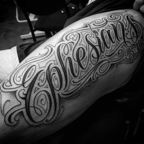 Old English Cursive Tattoo