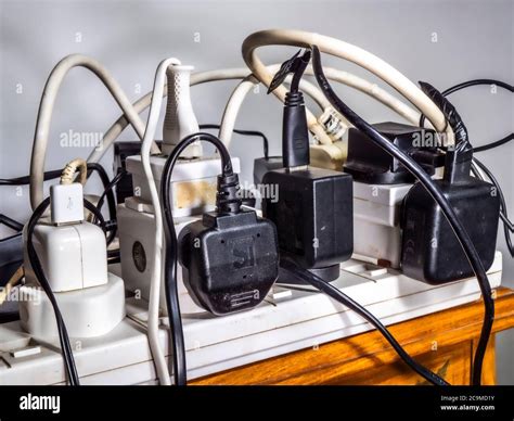 Overloaded sockets uk hi-res stock photography and images - Alamy