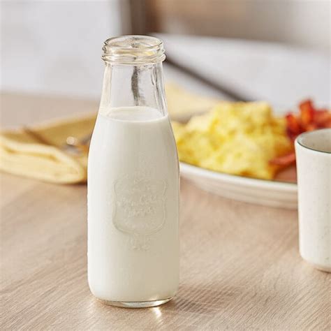 Acopa 14 oz. Embossed Glass Milk Bottle - 12/Case