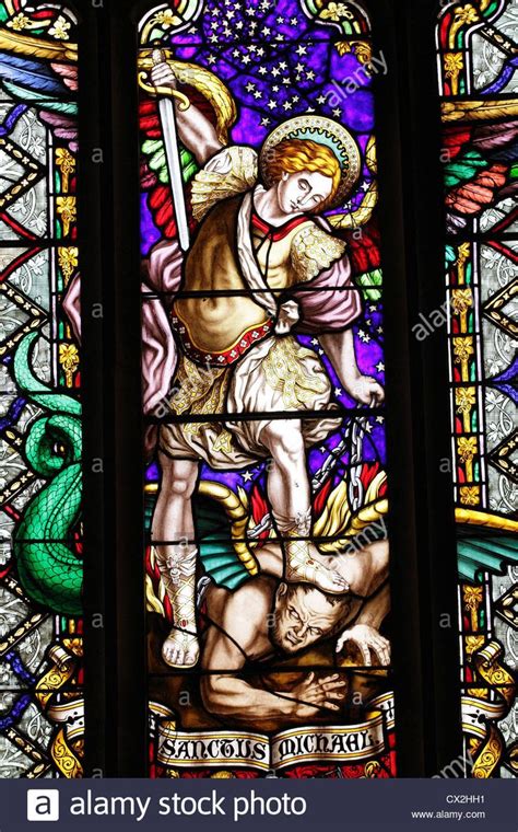 A stained glass window depicting St Michael in the Parish Church at ...