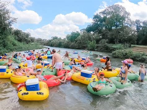 Tubing on the San Marcos River near Austin, TX - Suitcase and Heels