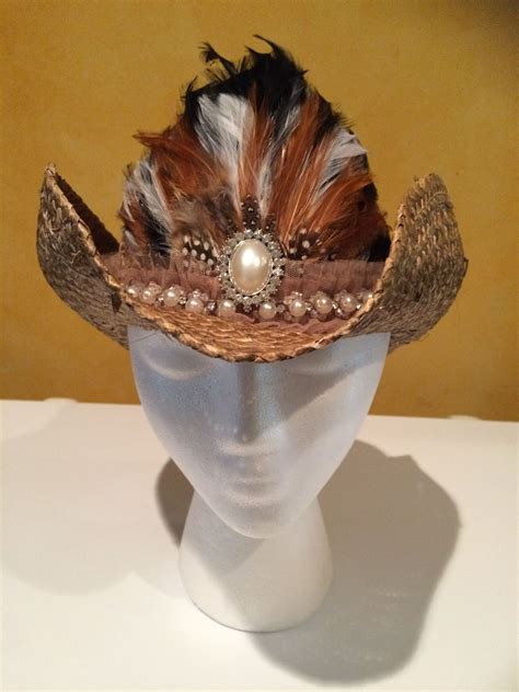 Straw Bendable cowboy hat. Full feather plume in front with lace and ...