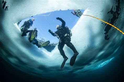 Winter ice diving underwater in a quarry in Canada | By The Shore Scuba ...