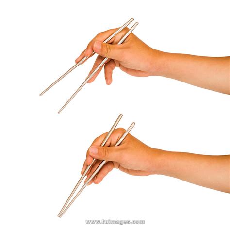 stock images chopstick instructions, isolated hand holding chopstick ...