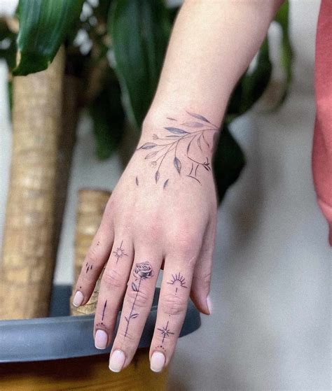 Inner finger tattoo ideas photos