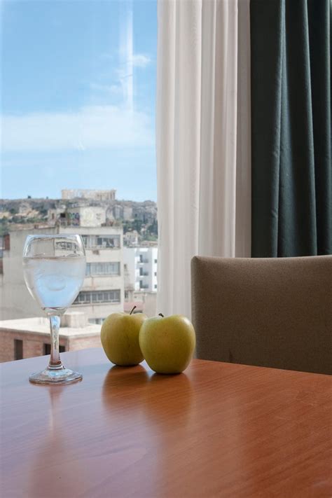 Arion Athens Hotel rooms have nice, comfortable beds, large windows ...