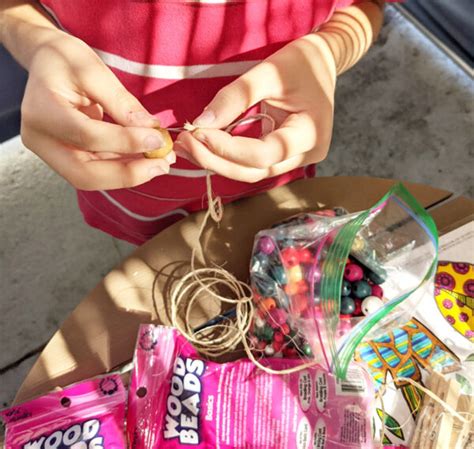 Hanging Kids Sukkah Decorations on a DIY Chain