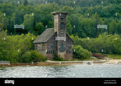 Old wood lighthouse pictured rocks hi-res stock photography and images ...