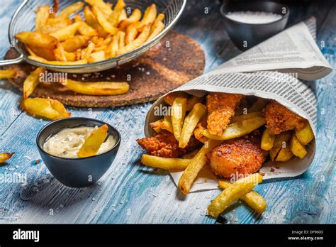 Homemade Fish & Chips and sauce Stock Photo - Alamy