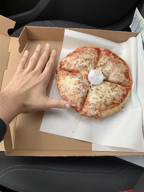 Calories in 8 inch deep dish? Hand for comparison lol : r/caloriecount