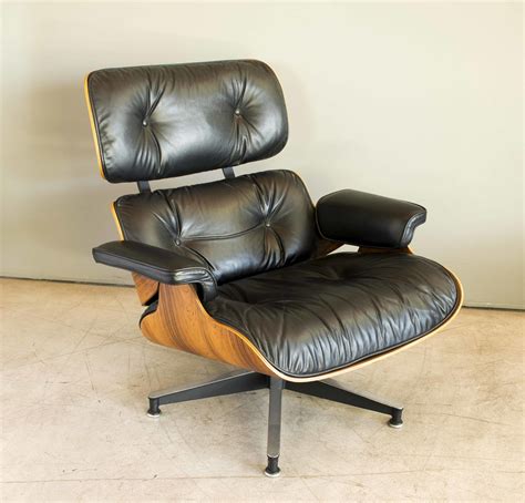 Charles And Ray Eames Chair / Rosewood Edition lounge chair by Charles ...