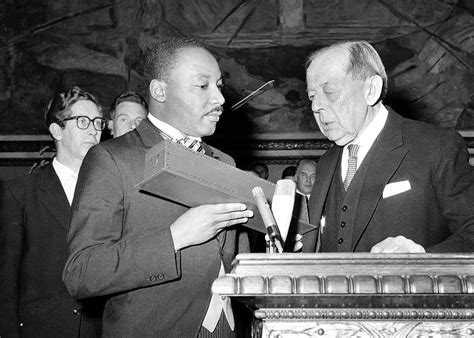 Dr. Martin Luther King Jr. receives the Nobel Peace Prize from Gunnar ...