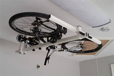 flat-bike-lift raises the roof on bike storage | Indoor bike storage ...