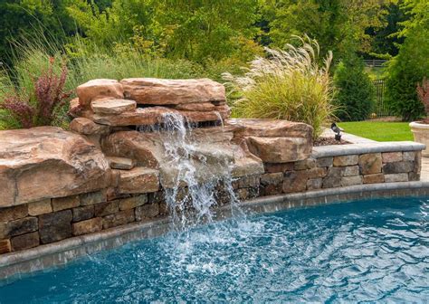 Enhance Your Backyard Pool with a Water Feature - AVIVA POOLS