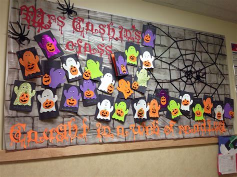 Halloween bulletin board. "Caught in a web of reading". | Halloween ...