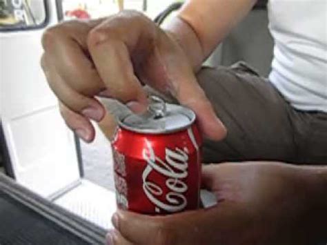 Old school Coca Cola ring pull in slow motion. - YouTube