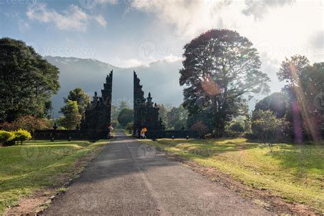 Ancient bali style gate with pathway in garden 7304684 Stock Photo at ...