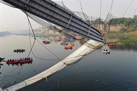 Pedestrian bridge collapses in India, killing at least 132