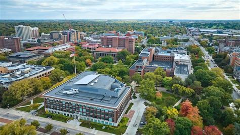 Premium Photo | Aerial view of university campus with autumn foliage ...