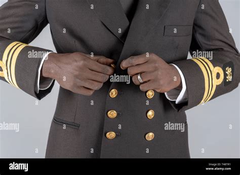 Lieutenant Commander wearing uniform of the South African Navy ...